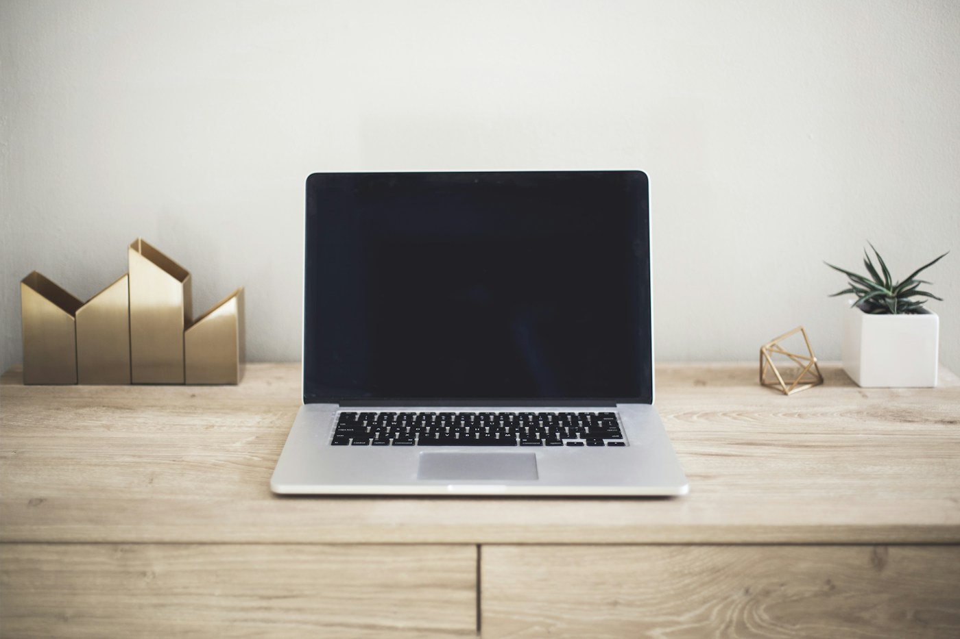 Laptop workspace for developing digital campaigns, content and brand communications